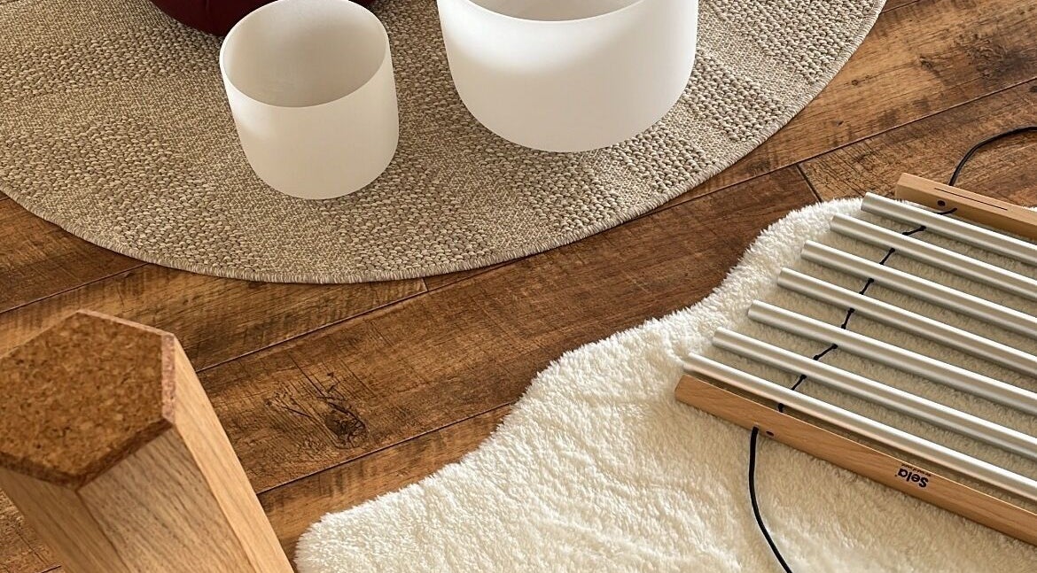 Wellness instruments at Hummingbird Haven, Bray, County Wicklow, IE, set on a cozy wooden floor.