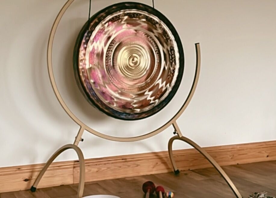 A decorative gong at Hummingbird Haven, Bray, County Wicklow, IE, offering tranquility and sound therapy.