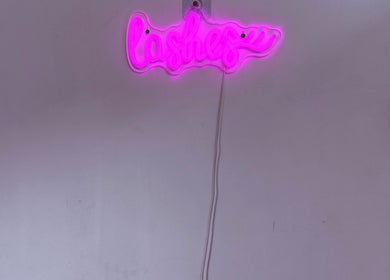 Pink neon 'Lashes' sign adds vibrant charm to Bai Beauty Bar, Kingston, St. Andrew Parish, JM.
