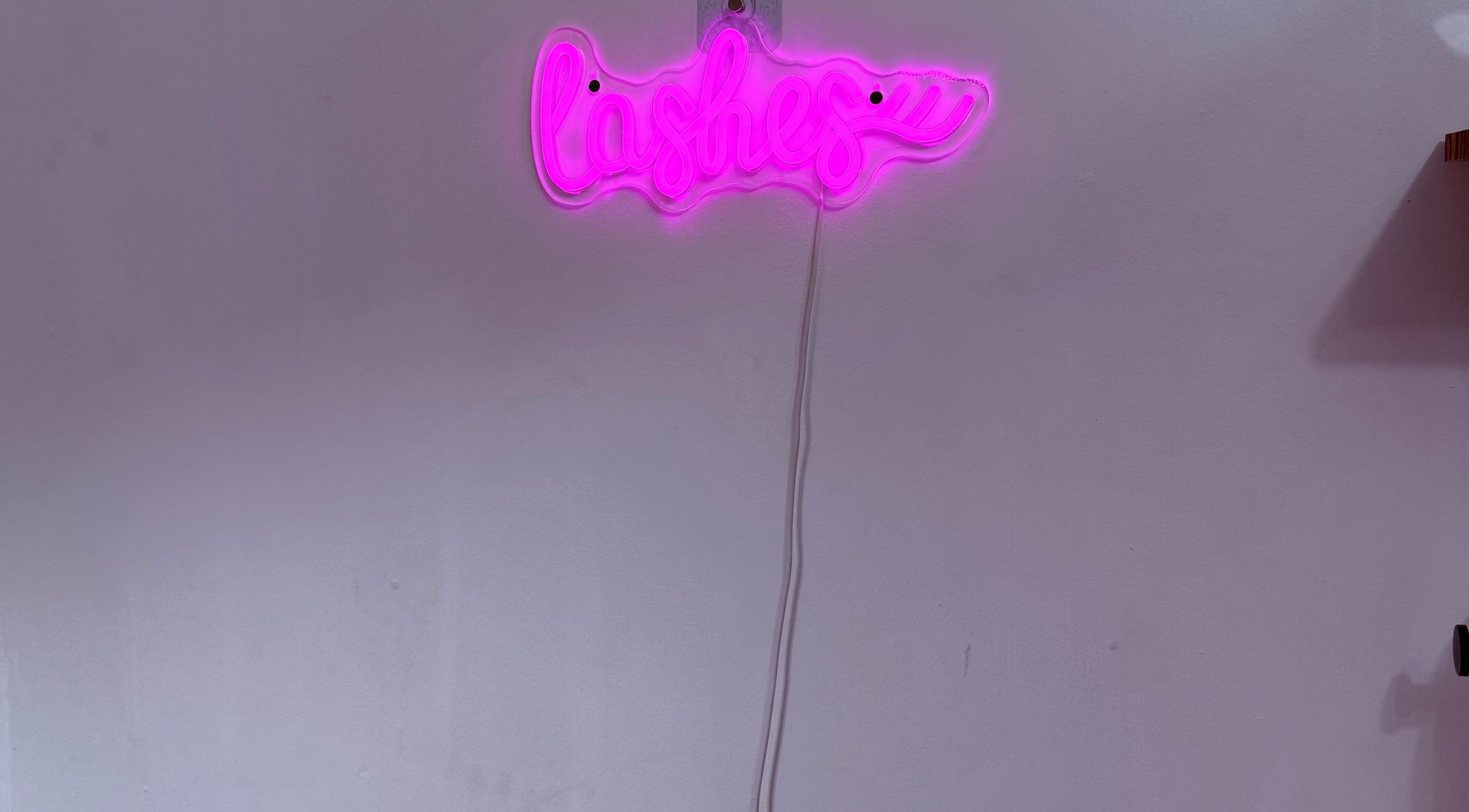 Pink neon 'Lashes' sign adds vibrant charm to Bai Beauty Bar, Kingston, St. Andrew Parish, JM.