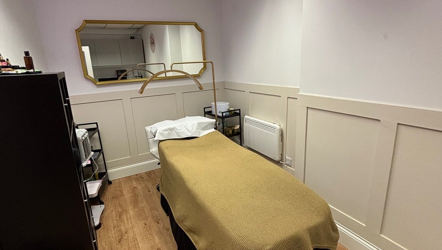 Tranquil treatment room at The Beauty Loft, Kirkby In Ashfield, England, GB. Elegant decor and massage table.