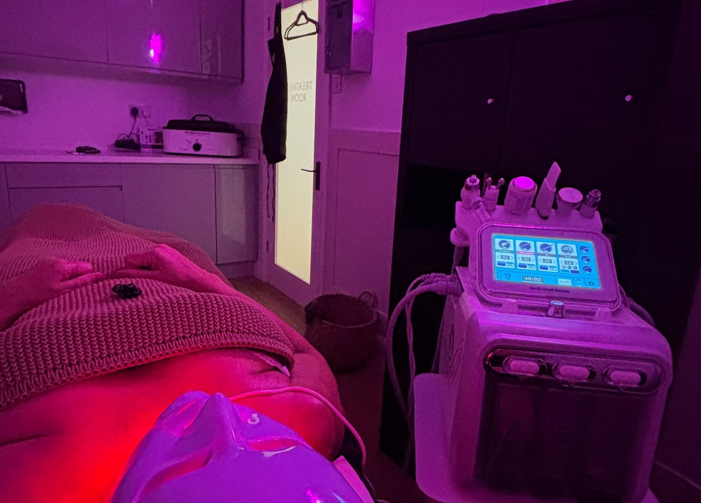 A serene treatment room at The Beauty Loft in Kirkby In Ashfield, England, showcasing advanced spa equipment.