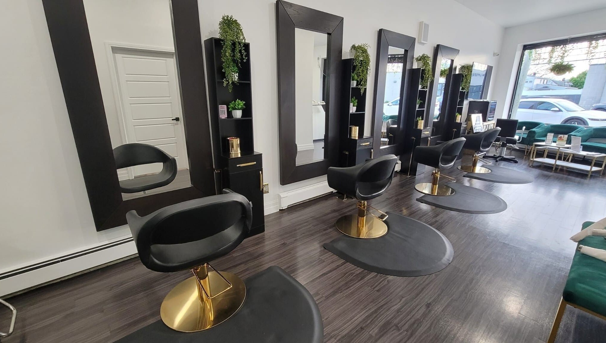 Sleek salon chairs and mirrors at Rebelle X Health & Beauty Spa, North Massapequa, New York, US.