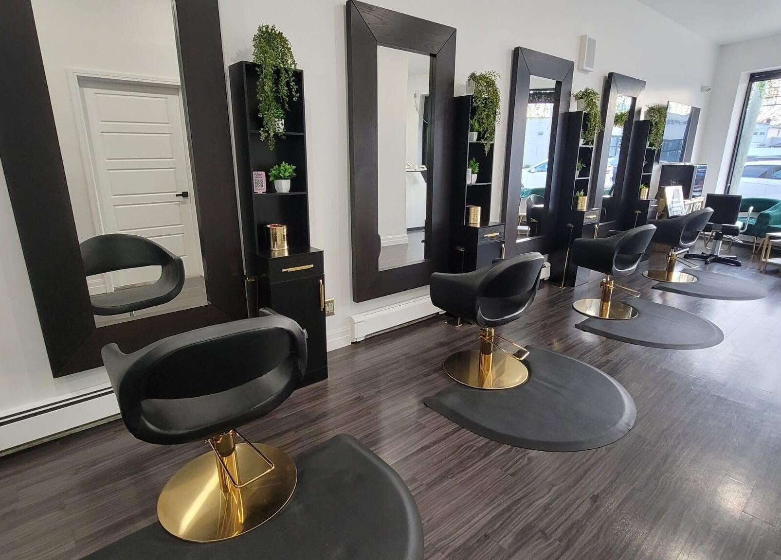 Sleek salon chairs and mirrors at Rebelle X Health & Beauty Spa, North Massapequa, New York, US.