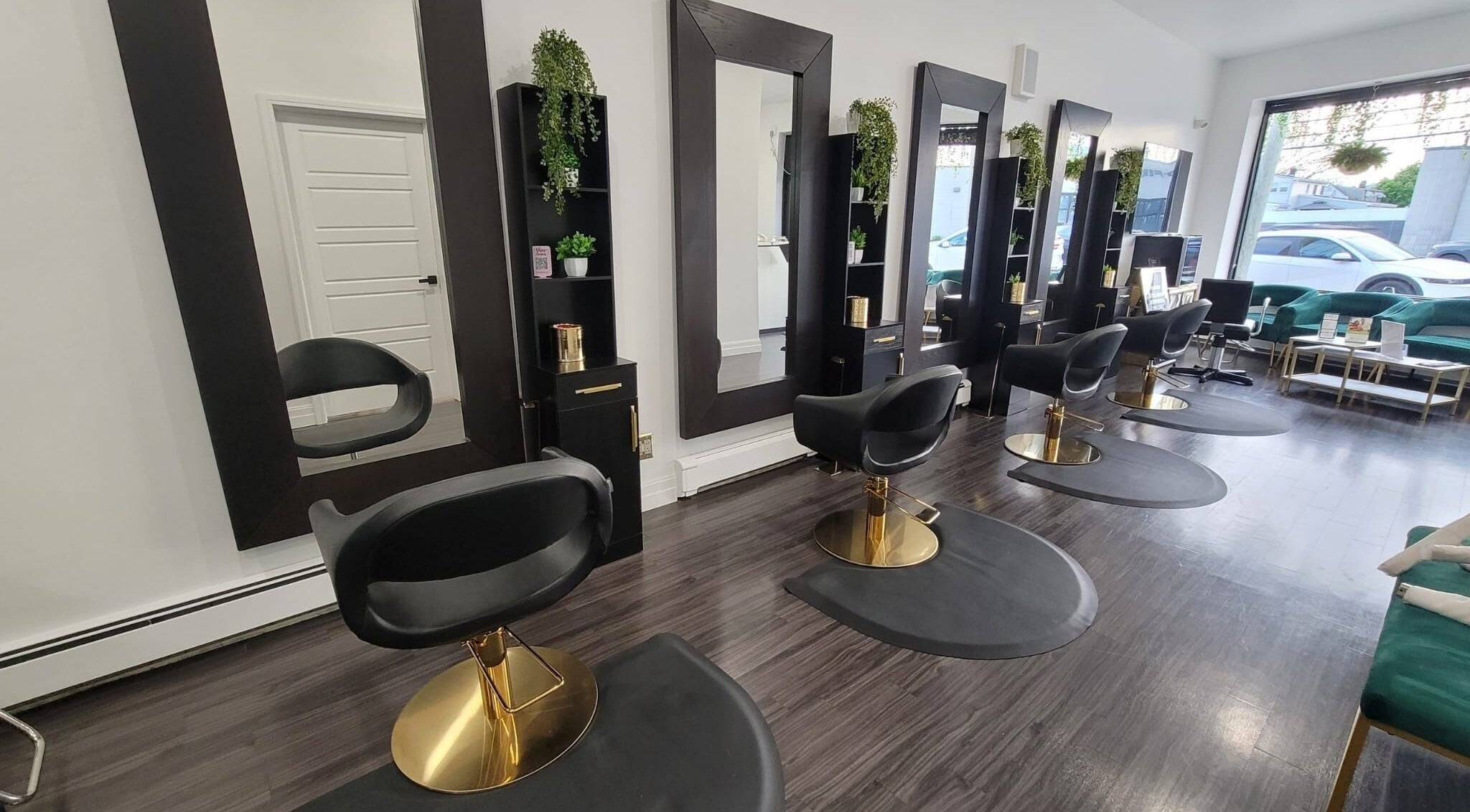 Sleek salon chairs and mirrors at Rebelle X Health & Beauty Spa, North Massapequa, New York, US.