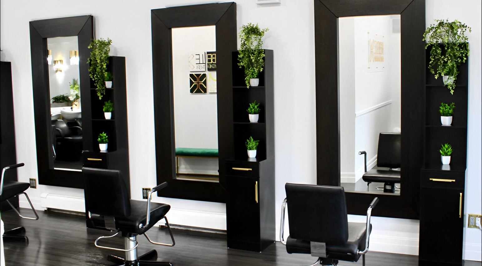 Elegant salon stations at Rebelle X Health & Beauty Spa, North Massapequa, New York, US, with sleek styling chairs.