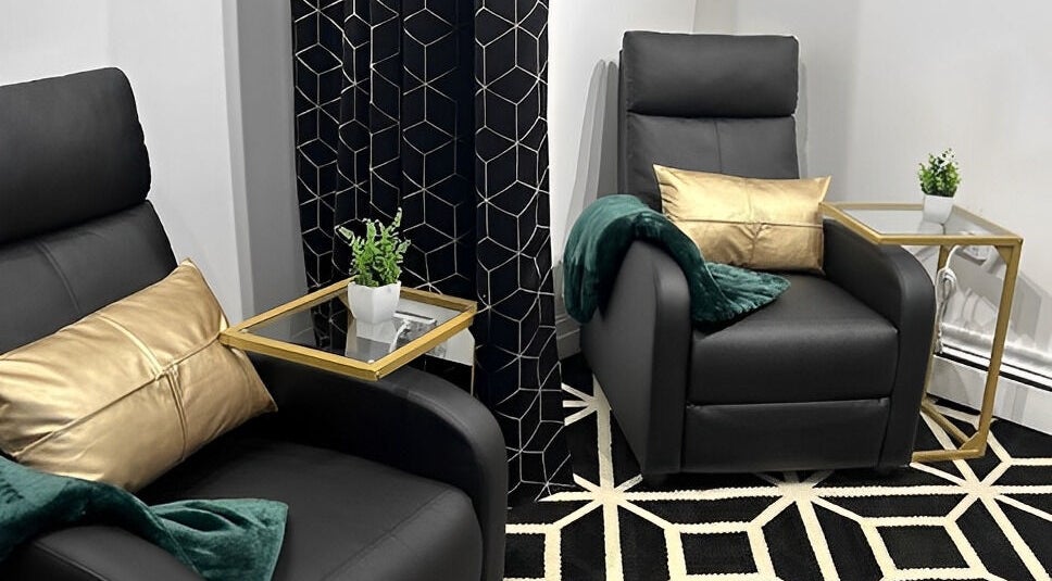 Elegant relaxation chairs at Rebelle X Health & Beauty Spa, North Massapequa, New York, US.