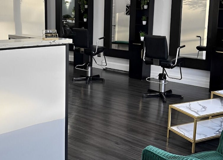 Modern salon interior at Rebelle X Health & Beauty Spa in North Massapequa, New York, US with sleek design.