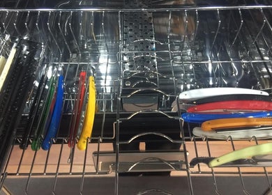Colorful barber razors and combs displayed at The British Barbers, Singapore, Singapore, SG.