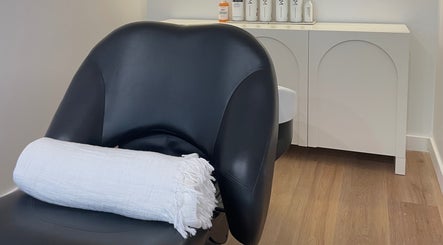 Comfortable salon chair at The Hair Space, Tallebudgera, Queensland, AU, ready for a pampering session.