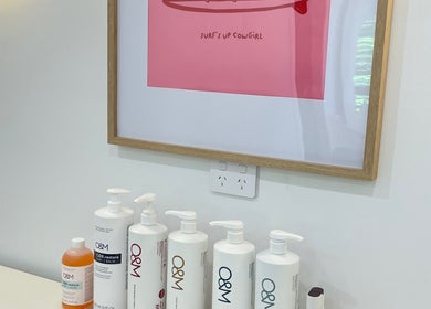 Stylish bathroom with O&M products and art at The Hair Space, Tallebudgera, Queensland, AU.