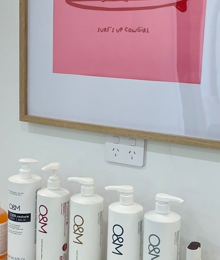 Stylish bathroom with O&M products and art at The Hair Space, Tallebudgera, Queensland, AU.