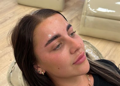 Client with expertly shaped brows at Waglash Brows, Solihull, England, GB, showcasing beauty enhancement.