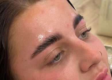 Close-up of a woman's well-groomed eyebrows at Lillia at Waglash Brows, Solihull, England, GB.