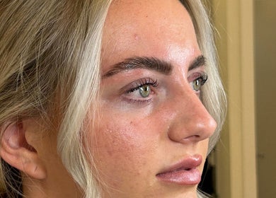 Close-up of perfectly shaped eyebrows at Brows at Henley House, Henley-in-Arden, England, GB.