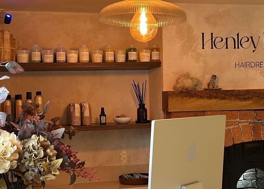 Elegant interior of Brows at Henley House, Henley-in-arden, showcasing shelves with beauty products.