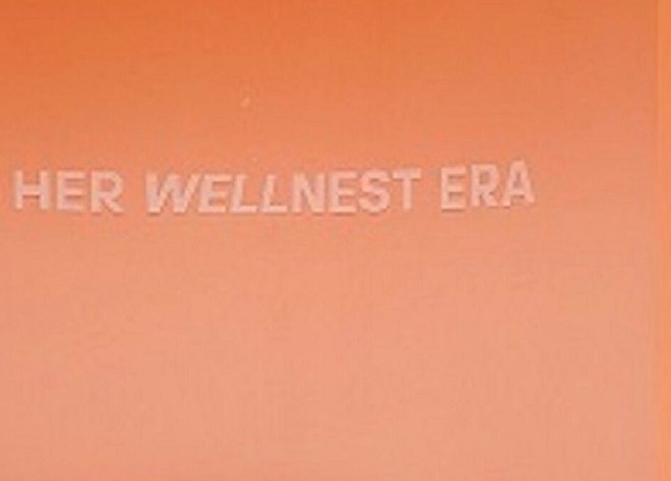 Peach wall with 'In Her Wellnest Era' text at Nest Retreat, Putrajaya, Selangor, MY.
