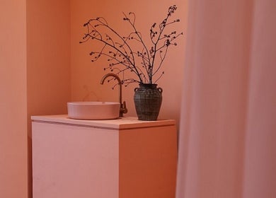 Elegant washbasin with vase at Nest Retreat, Putrajaya, Selangor, MY for serene wellness ambiance.