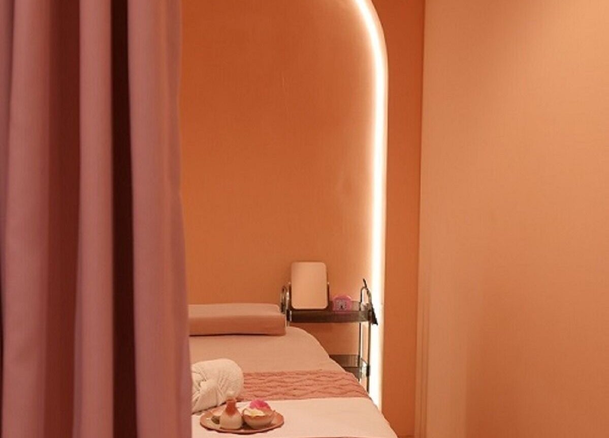 Cozy spa room at Nest Retreat in Putrajaya, Selangor, MY with soft lighting and plush bed.
