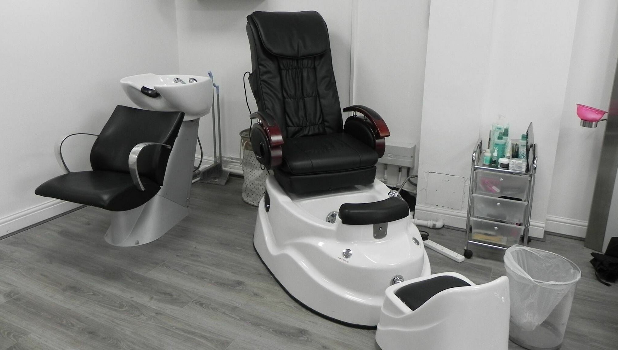 Modern salon pedicure chair and sink at Glamour Beauticians, Manchester, England, GB.