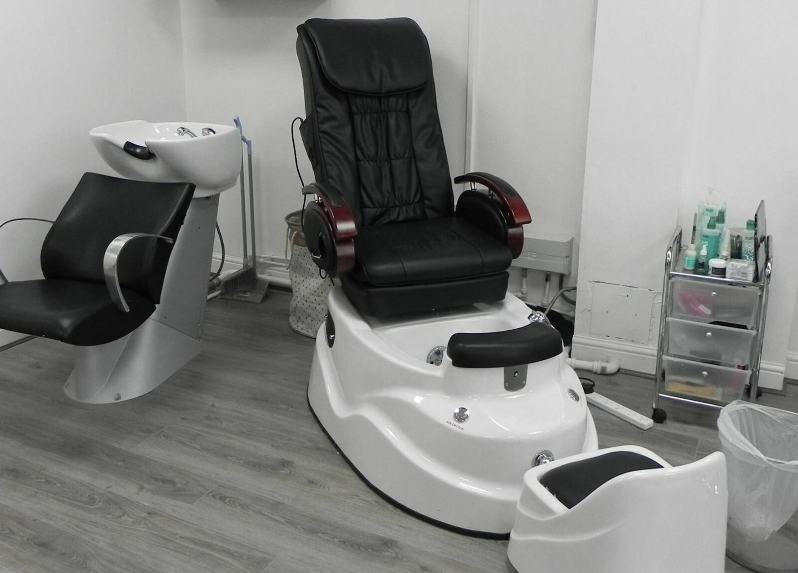 Modern salon pedicure chair and sink at Glamour Beauticians, Manchester, England, GB.