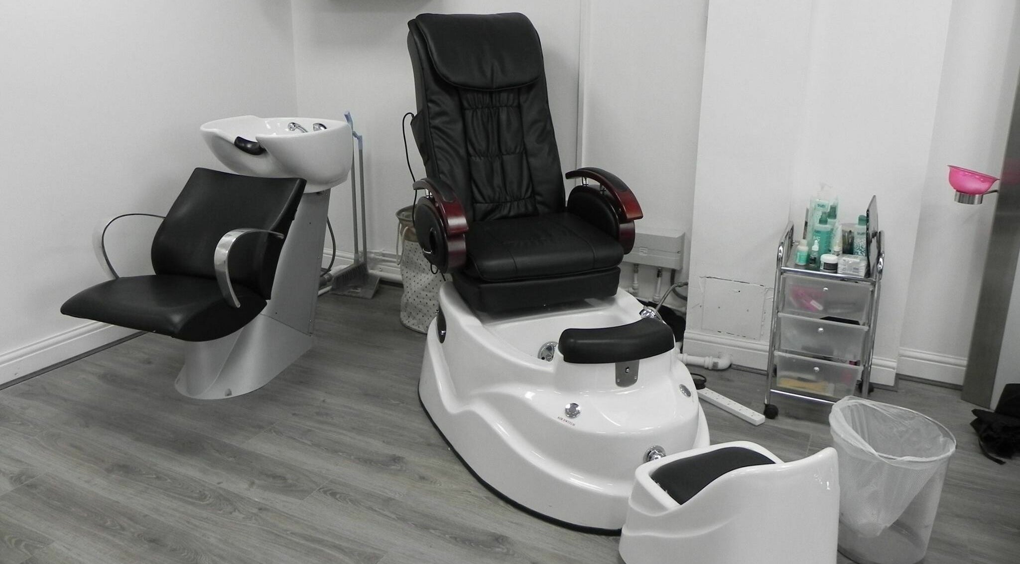 Modern salon pedicure chair and sink at Glamour Beauticians, Manchester, England, GB.