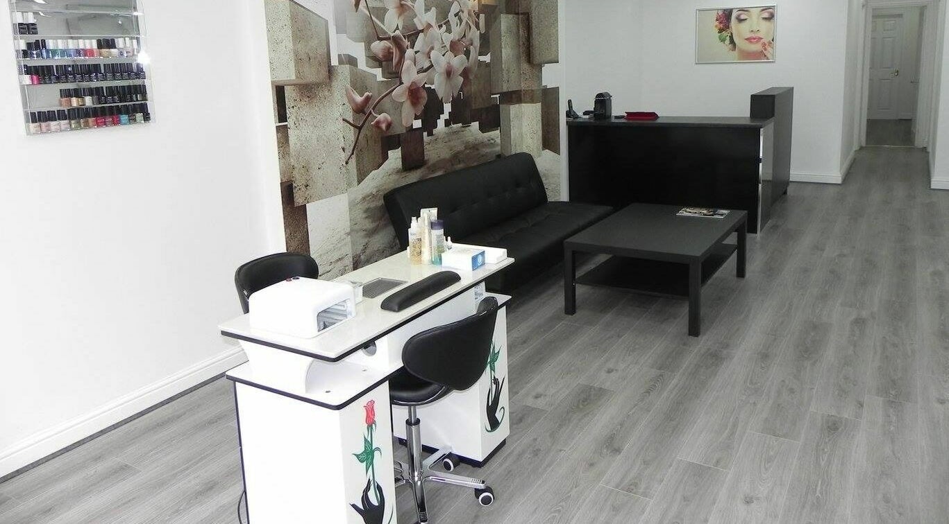 Elegant manicure station at Glamour Beauticians in Manchester, England, GB with modern decor.