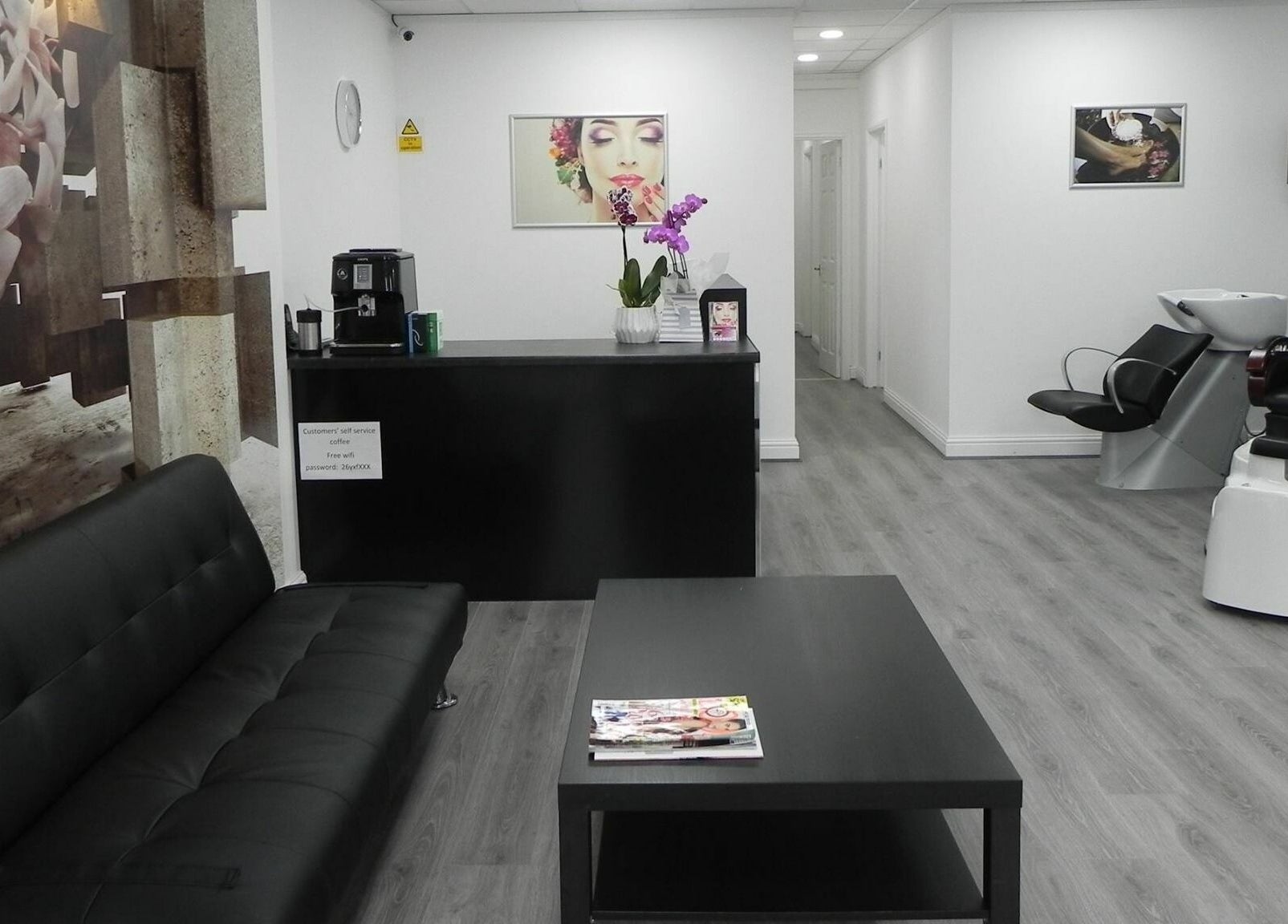 Modern lounge at Glamour Beauticians, Manchester, England, GB with sleek furniture and calm ambiance.