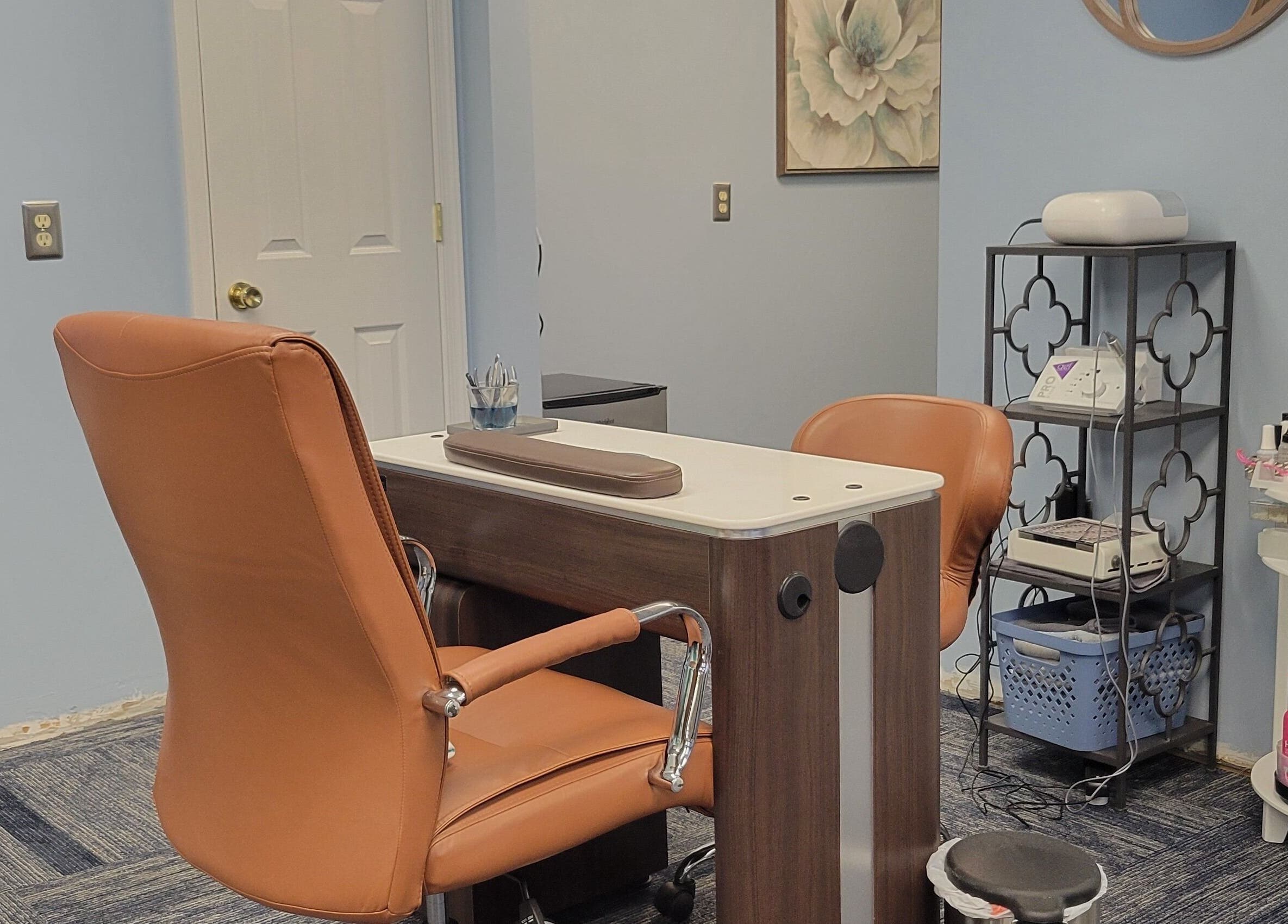 Cozy nail care station at Good Vibes Salon in Hanover, Pennsylvania, US. Inviting leather chairs and organized tools.