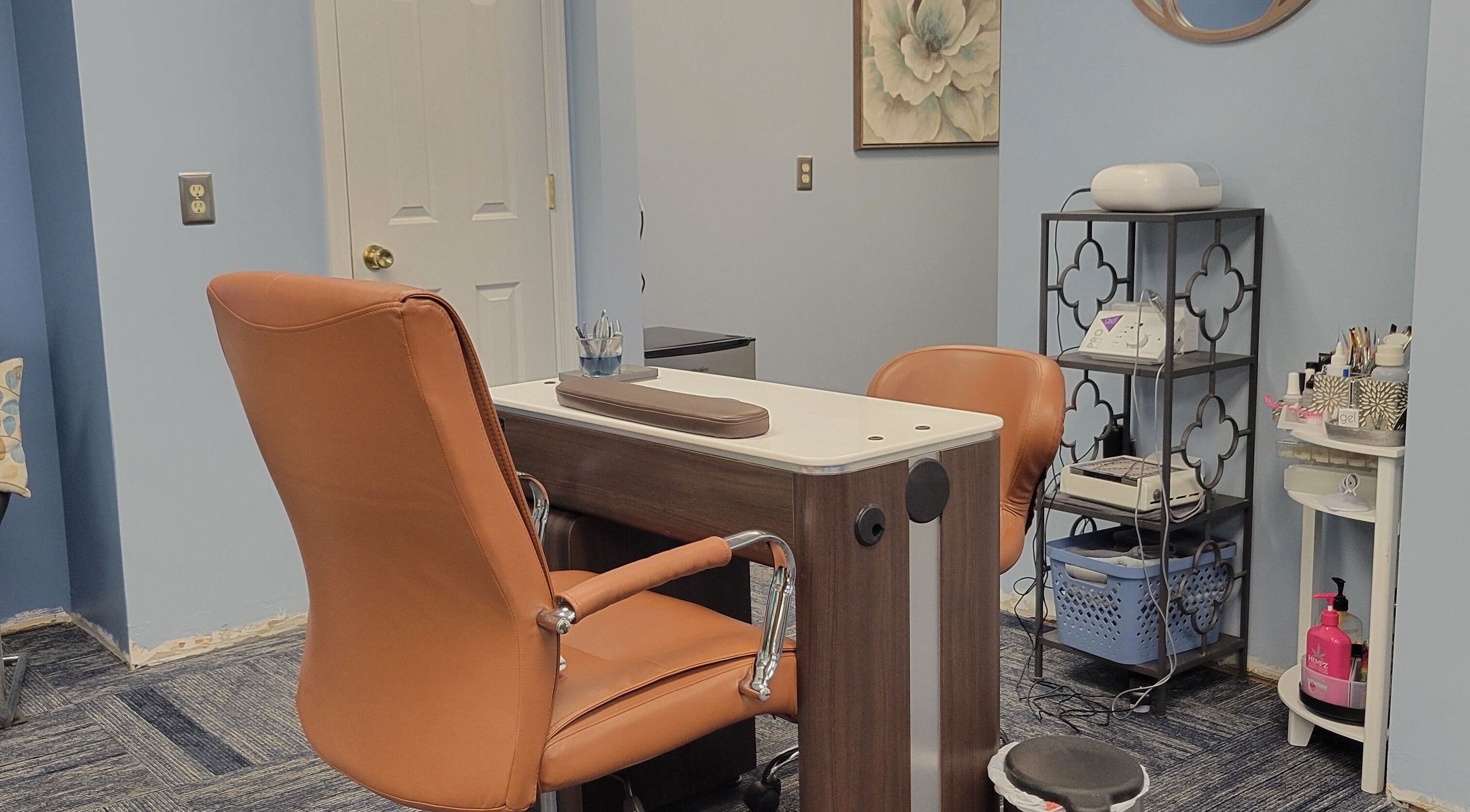 Cozy nail care station at Good Vibes Salon in Hanover, Pennsylvania, US. Inviting leather chairs and organized tools.