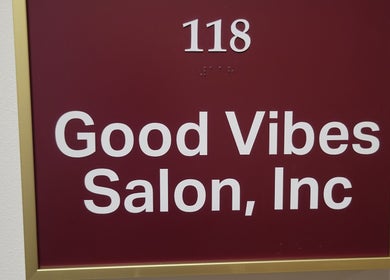 Entrance sign for Good Vibes Salon located in Hanover, Pennsylvania, US with room number 118.