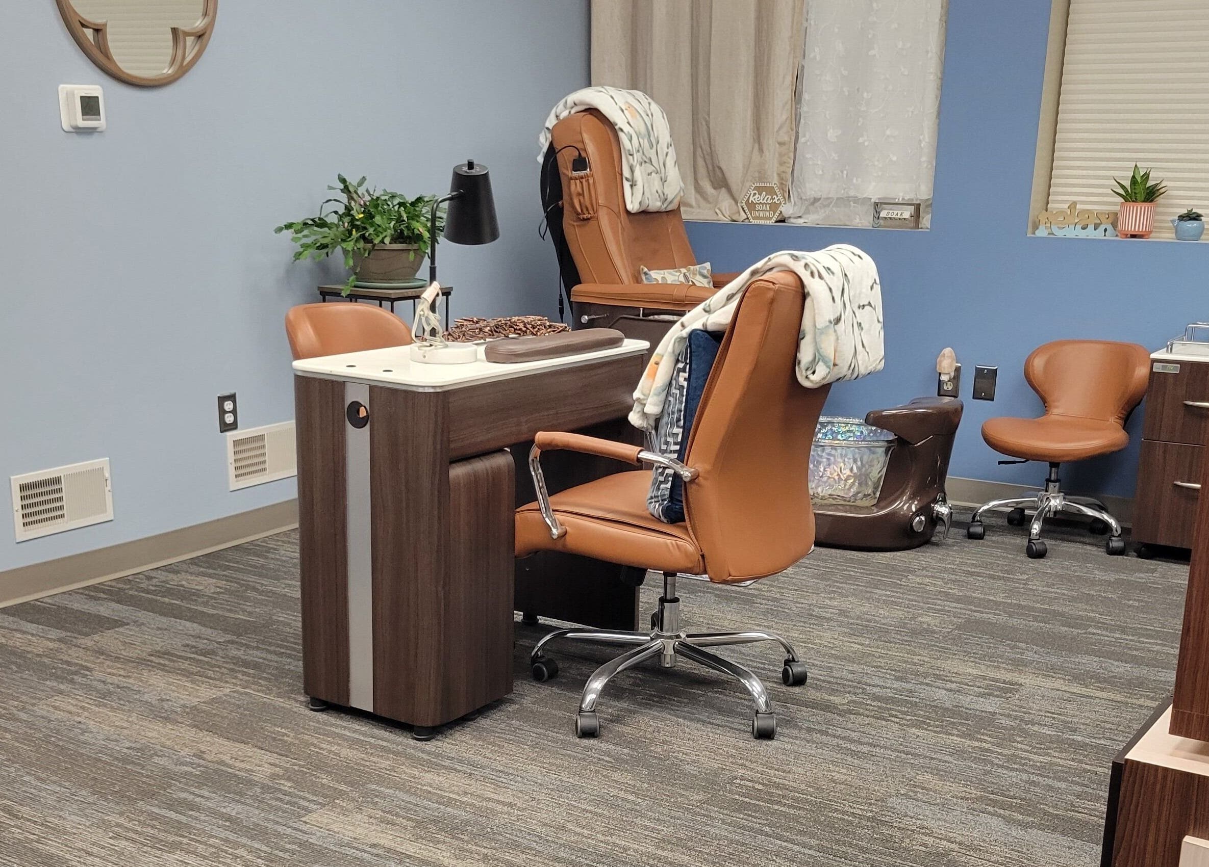 Relaxing pedicure station at Good Vibes Salon in Hanover, Pennsylvania, US with plush chairs and calming decor.
