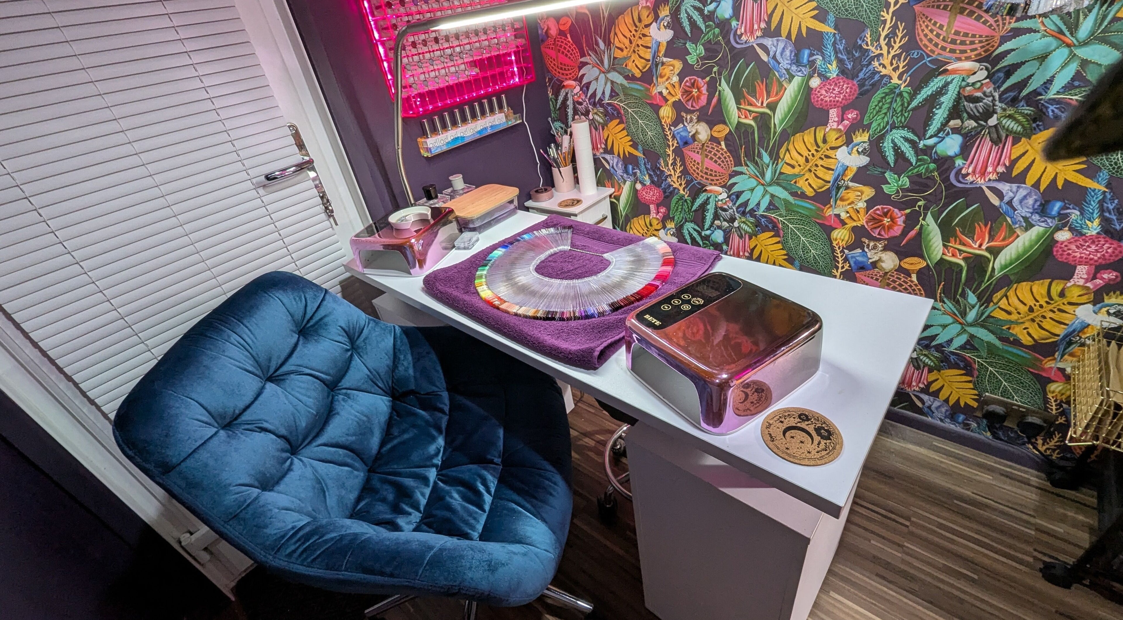 Stylish nail station at The Nailbox Netherton, Dudley, England, GB, with colorful decor and seating.