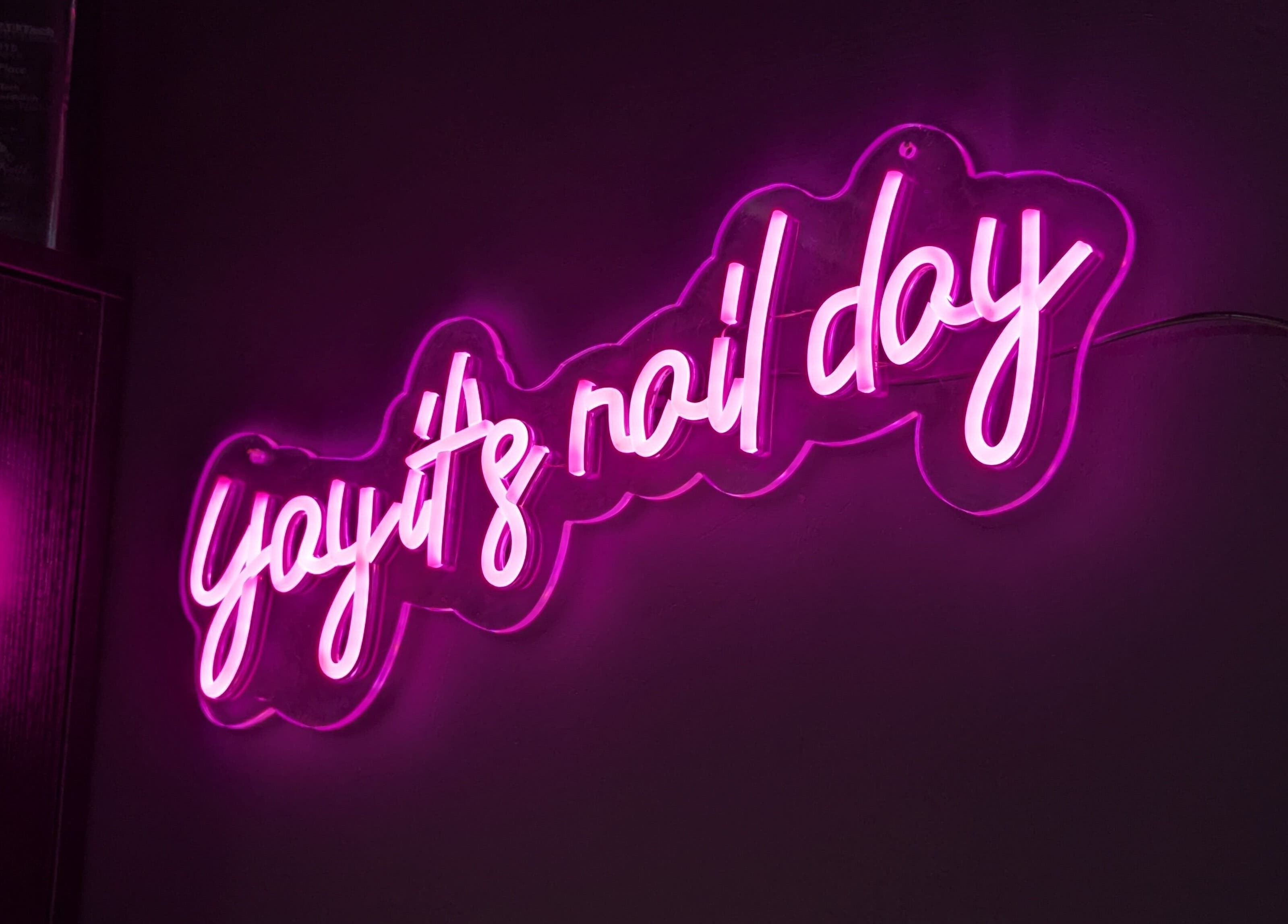 Neon sign 'yay it's nail day' at The Nailbox Netherton, Dudley, England, GB.