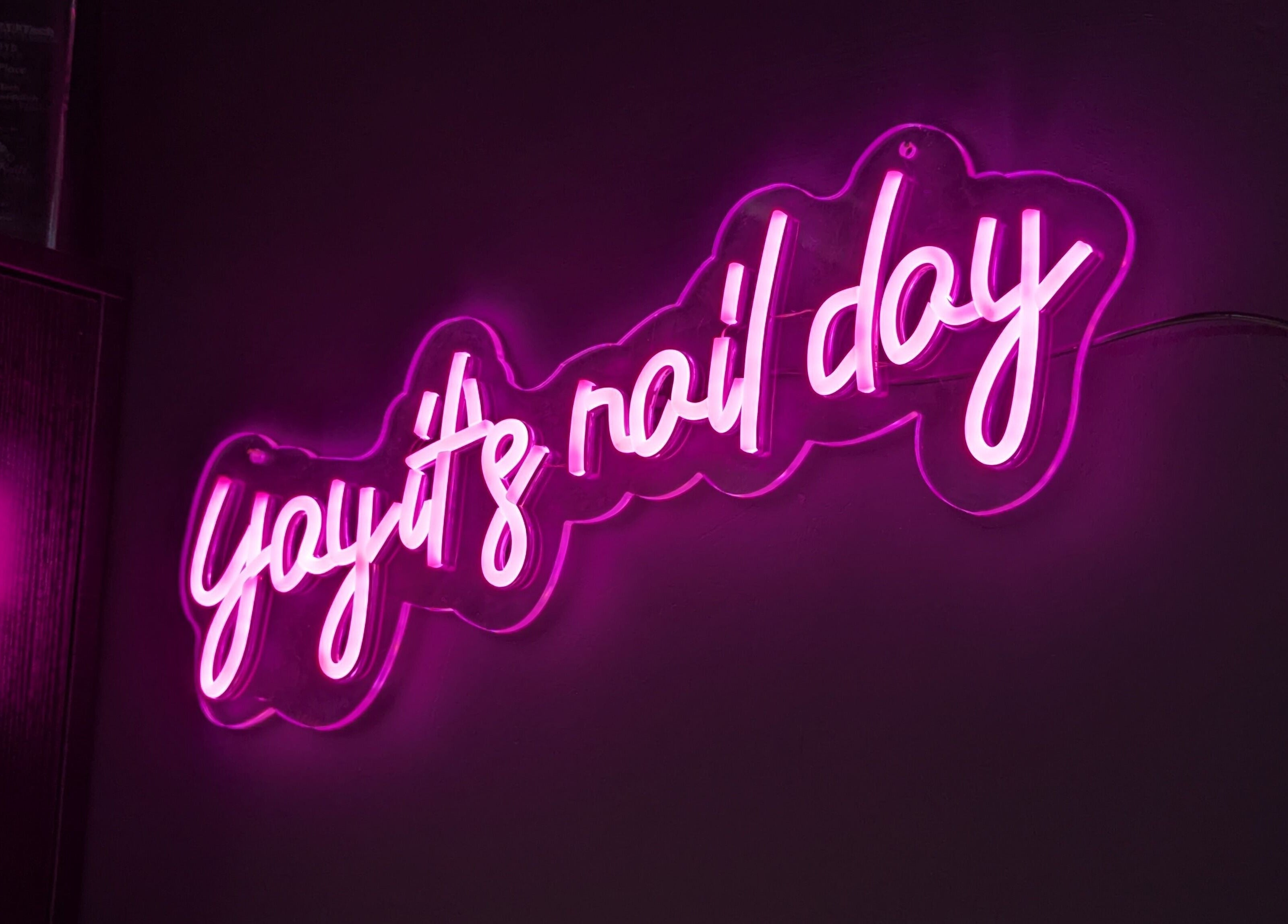 Neon sign 'yay it's nail day' at The Nailbox Netherton, Dudley, England, GB.