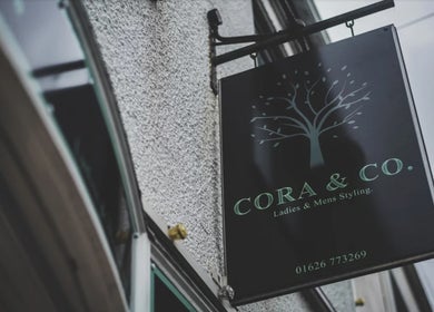Cora and Co signage outside venue in Teignmouth, England, GB, showcasing elegant design.