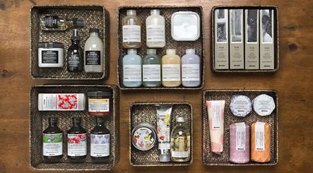 High-end beauty products in wicker baskets at Cora and Co, Teignmouth, England, GB.