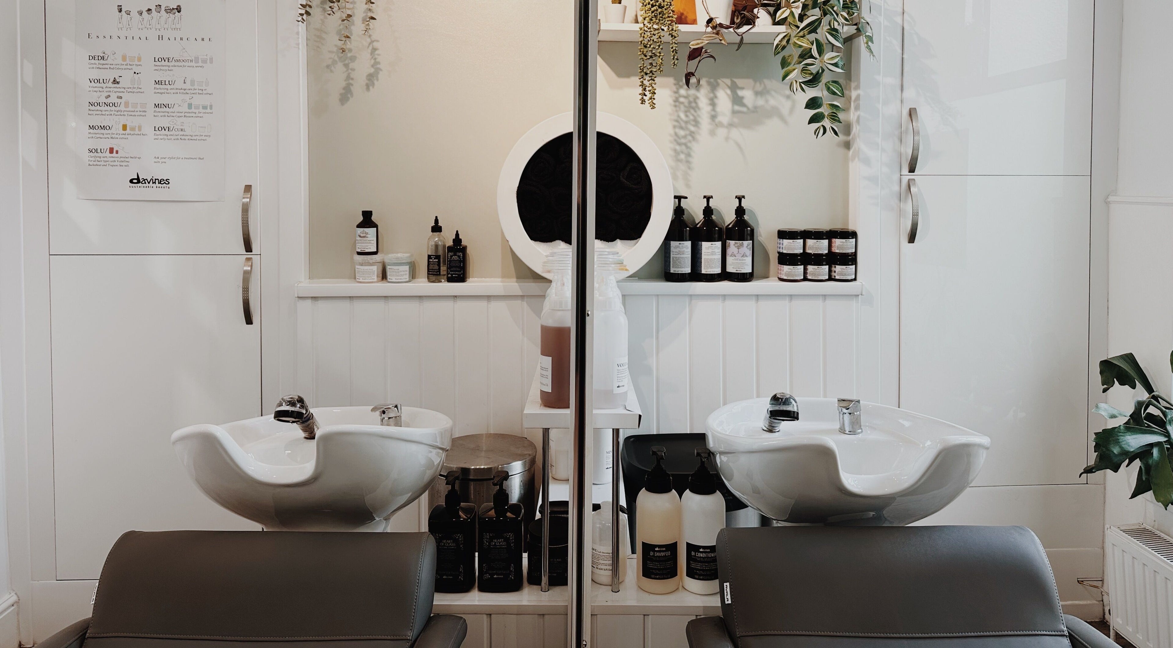 Elegant hair wash station at Cora and Co, Teignmouth, England offering a tranquil beauty experience.