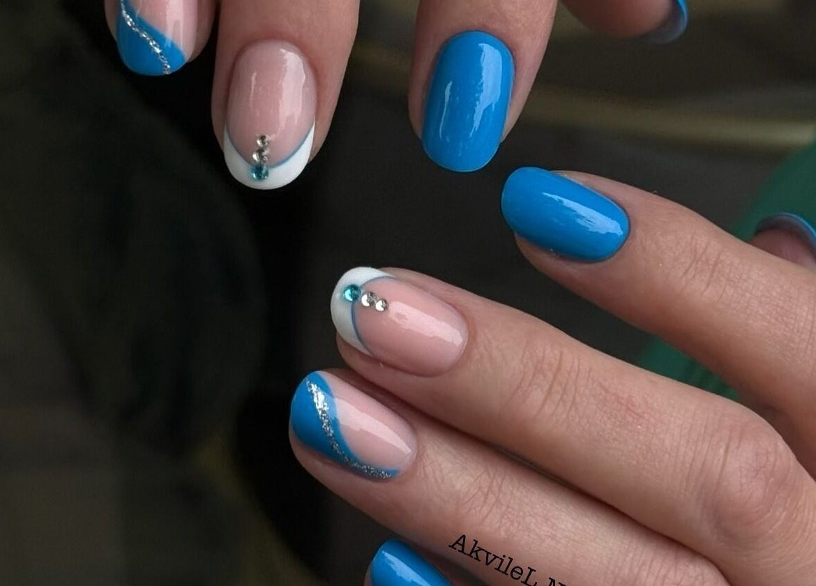 Elegant blue and nude nails with rhinestones at AkvileL Nails, Mullingar, County Westmeath, IE.
