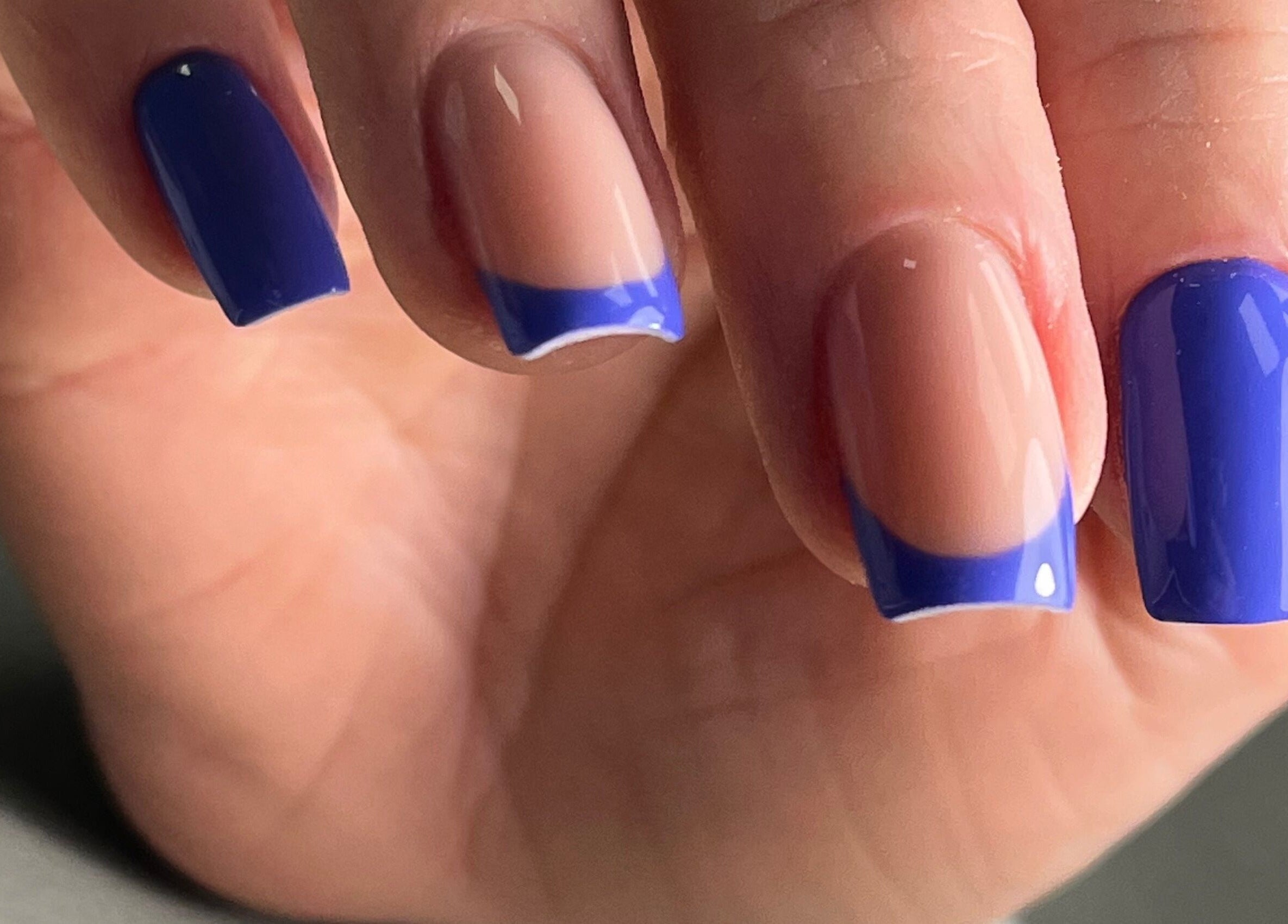 Stylish blue French manicure at AkvileL Nails, Mullingar, County Westmeath, IE, showcasing nail art expertise.