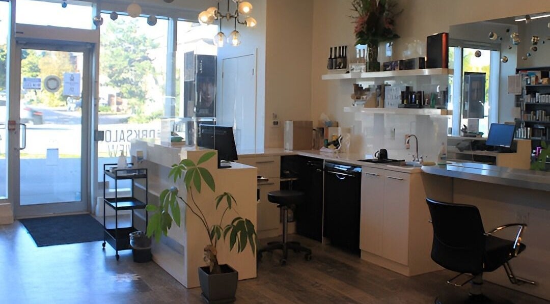 Bright and stylish interior of DBK Salon Bayview, Toronto, Ontario, CA with modern design and greenery.