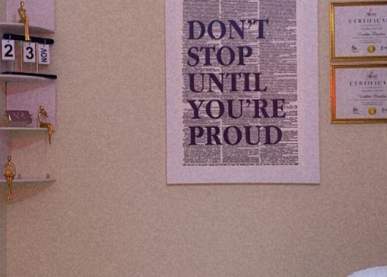 Inspiring wall decor at VR Beauty Room, featuring awards in Willemstad, Curaçao, CW.