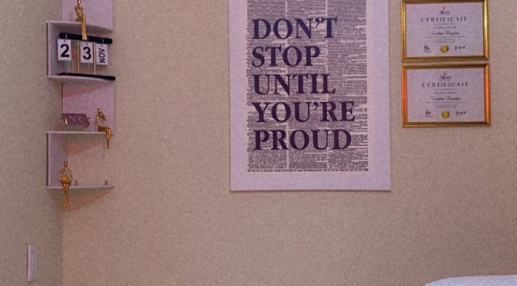 Inspiring wall decor at VR Beauty Room, featuring awards in Willemstad, Curaçao, CW.