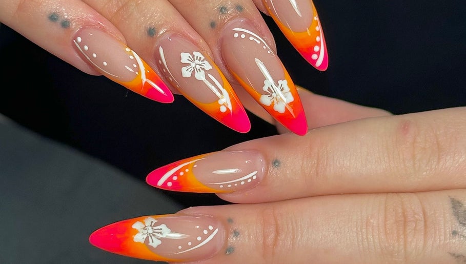 Colorful floral nail art by Nails by Emeli at Halfway, England, GB showcases bright orange and pink designs.