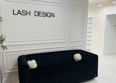 Sleek waiting area at Lash Design -River North in Chicago, Illinois, US, showcasing modern decor and cozy seating.
