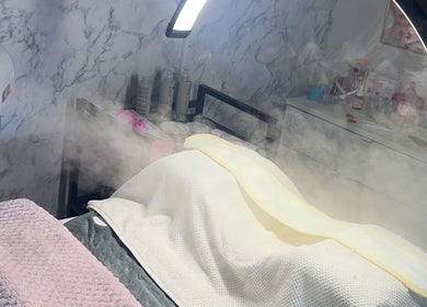 Relaxing spa setting with steam treatment at The Glow Room by Danielle, Pontypridd, Wales, GB.