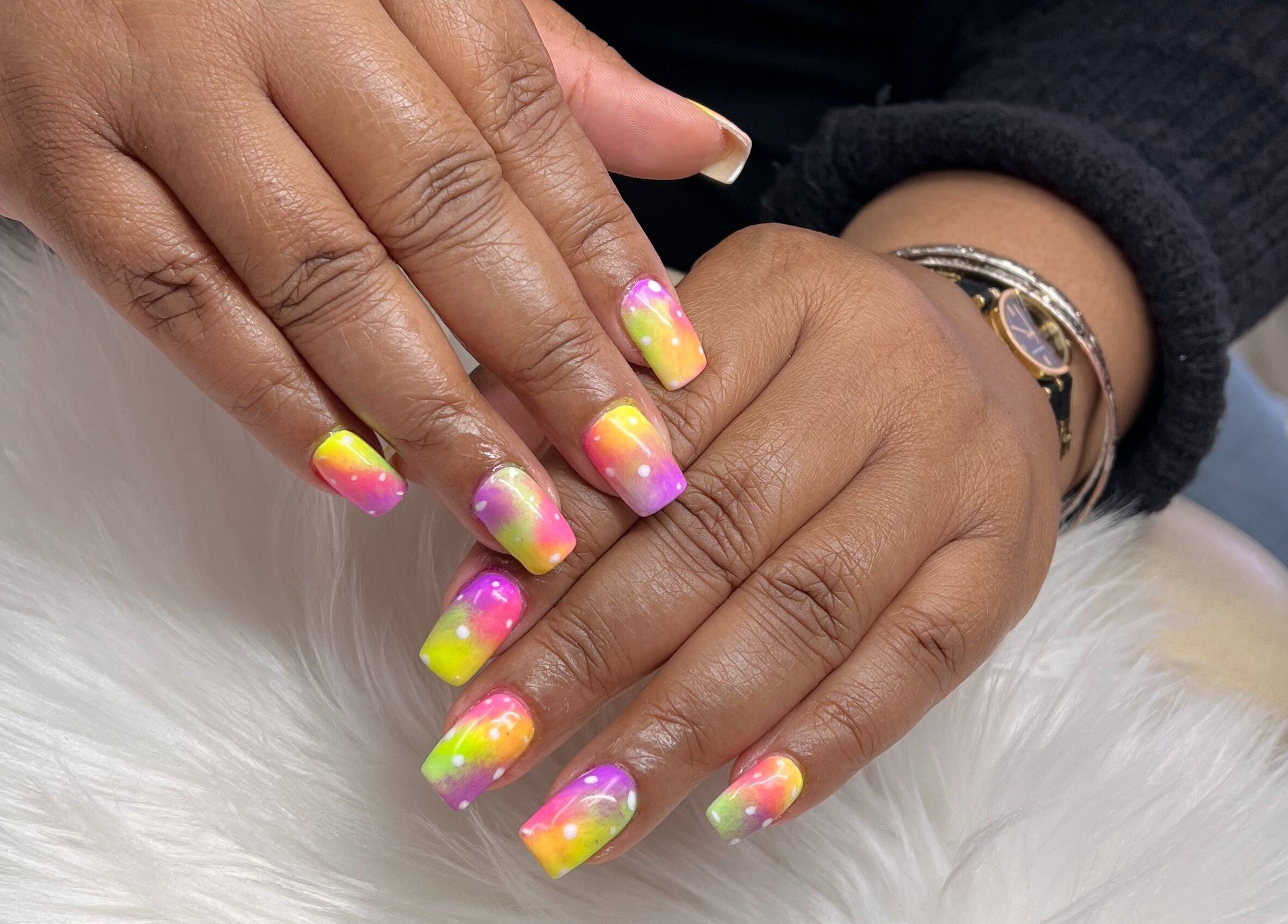 Vibrant neon nail art at Diva Nails in Methuen, Massachusetts, US showcasing a colorful design.