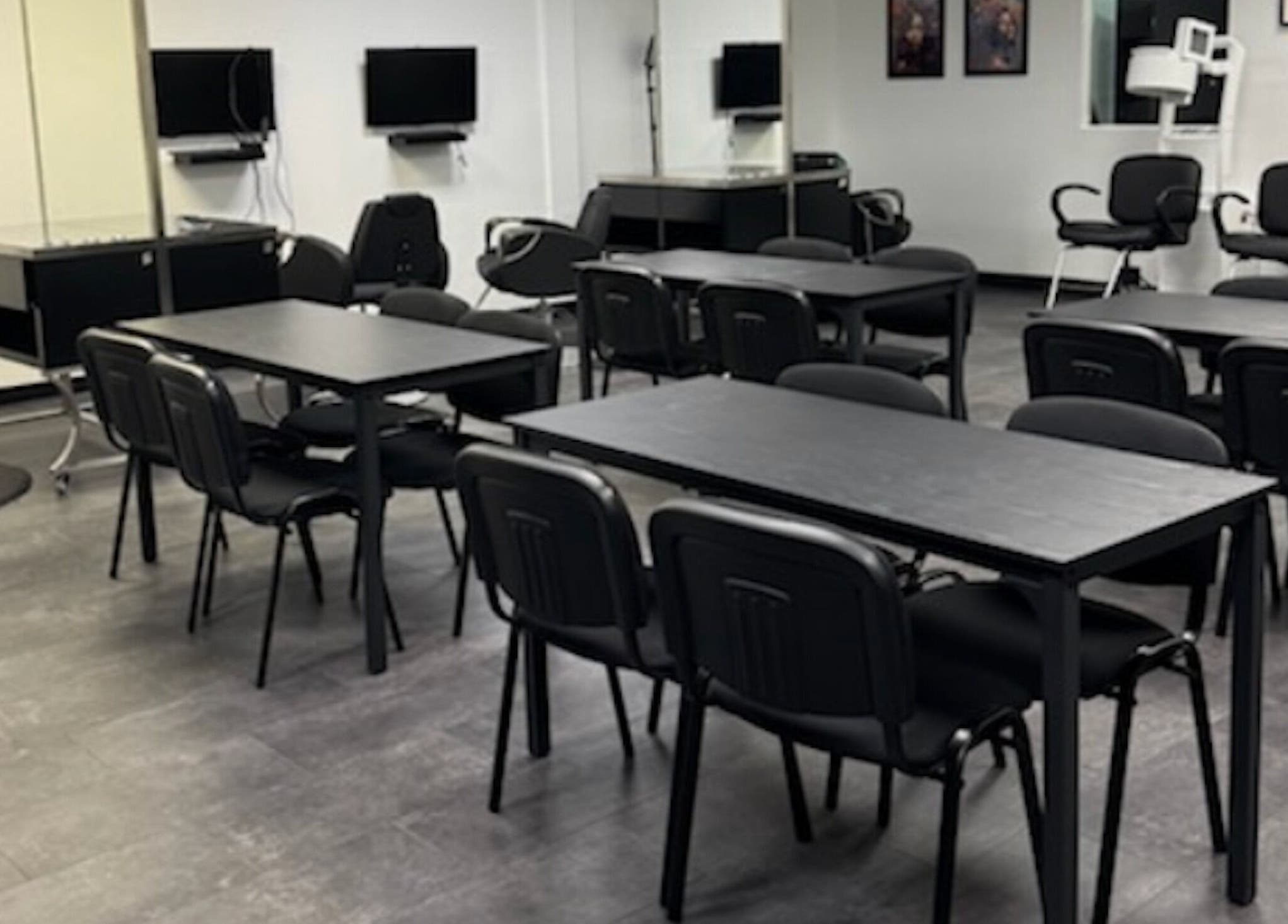 Chic salon setup at Fluent Strands, San Antonio, Texas, US showcasing modern design and comfy seating.