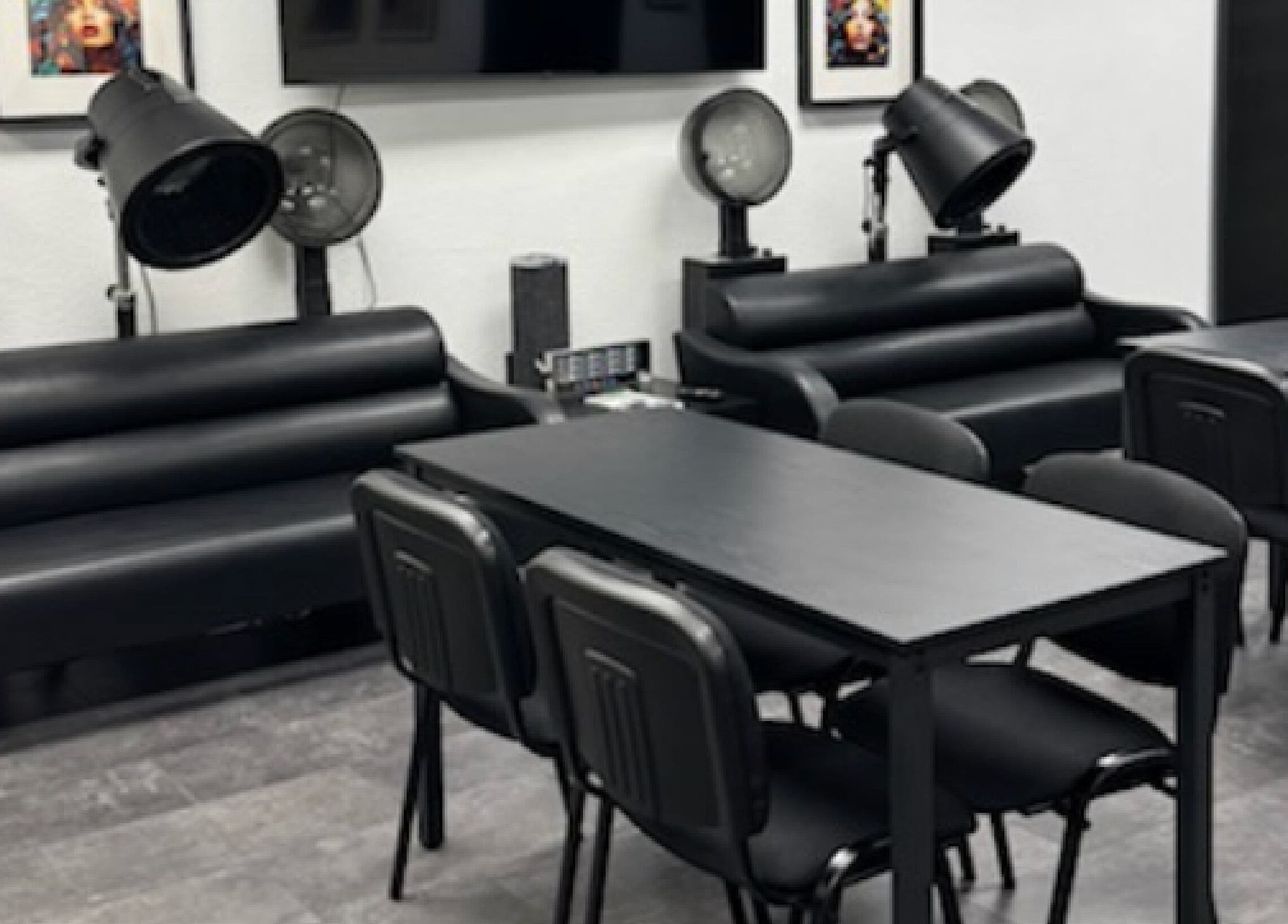 Modern salon seating with dryers at Fluent Strands, San Antonio, Texas, US.
