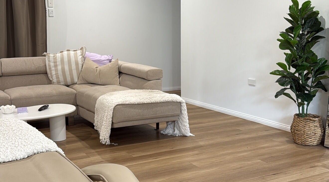 Relaxing lounge space at Studio Bloom Beauty, Cattai, New South Wales, AU with elegant decor and modern furnishings.